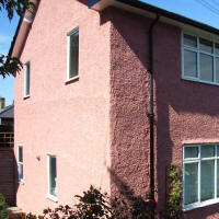 Pink painted exterior of south London house