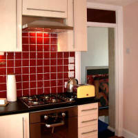 New fitted Kitchen with cooker and hood, plus new tiles